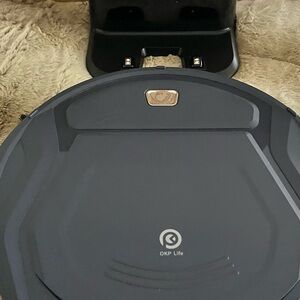 Black Robotic Vacuum Cleaner
